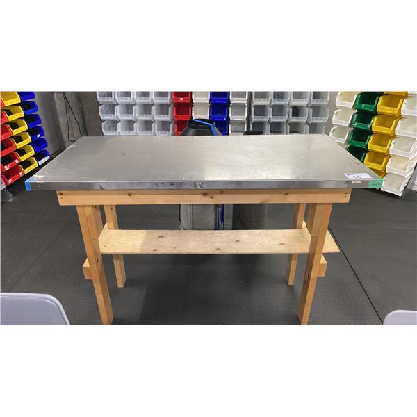 WOOD FRAME TABLE WITH STAINLESS STEEL TOP COVER APPROX 58"L X 26"D X 40"H