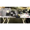 Image 4 : 2 WHITE ADJUSTABLE HEIGHT TABLES WITH ASSORTED OFFICE/SHIPPING SUPPLIES INCLUDING TAPE DISPENSERS,