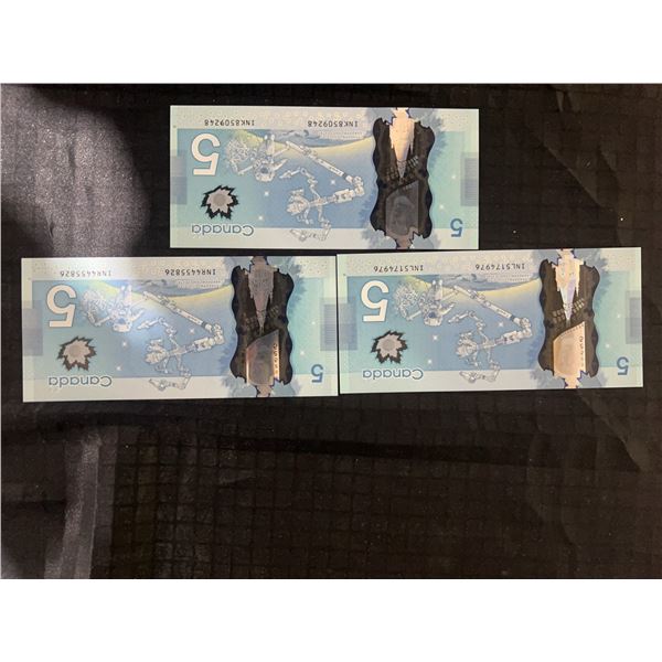Three Canadian $5 Polymer Banknotes