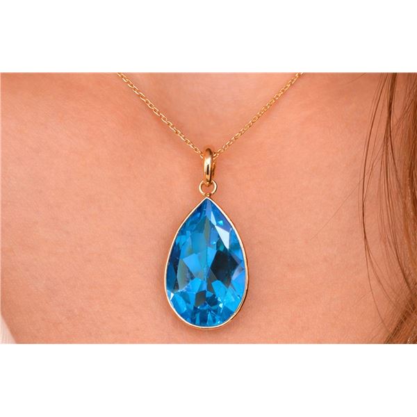 10k(1.31g), Blue Topaz (6.65ct) Pendant Retail value $1000
