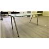 Image 2 : GLASS TOP/CHROME ADJUSTABLE HEIGHT DESK TABLE APPROX 63"L X 31.5"D