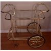 Image 5 : Gold-Tone Metal and Glass Two-Tier Bar Cart with Large Vase and Artificial Flowers