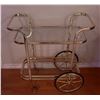 Image 6 : Gold-Tone Metal and Glass Two-Tier Bar Cart with Large Vase and Artificial Flowers