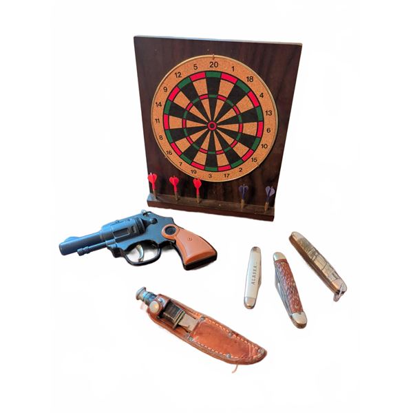 Dartboard, Toy Cap Gun, Pocket Knives and Sheathed Fixed Blade Knife Lot
