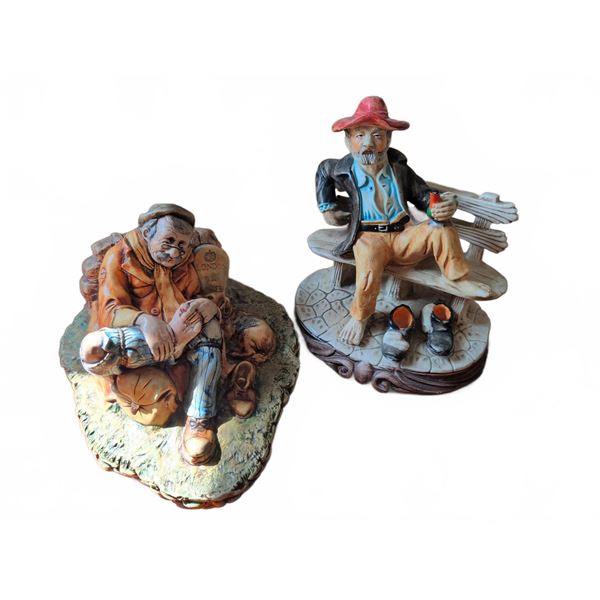 Painted Figurines Depicting Seated Men w/ Shoes Off
