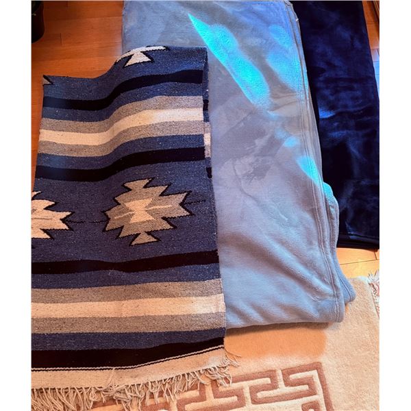 Blue and Neutral-Coloured Blankets and Rugs