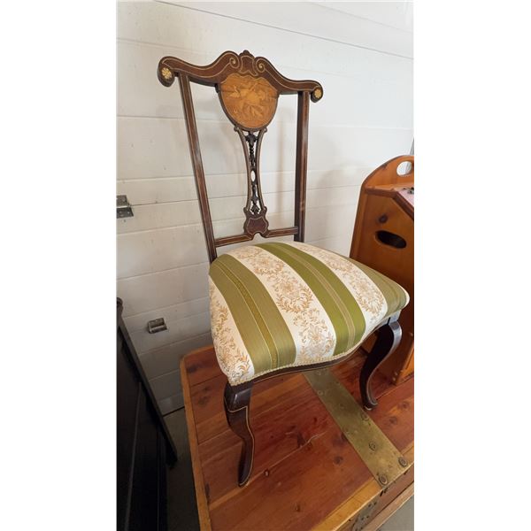 1800s vintage Wood side chair with floral and musical motif inlaid crest. Features decorative carved