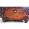 Image 7 : Chinese Rectangular hand-carved wooden chest featuring detailed floral carvings across the exterior 