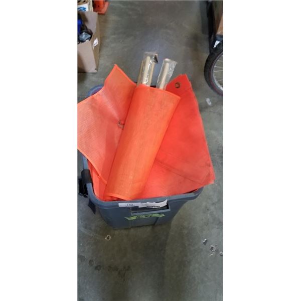 TOTE OF PROTECTIVE CHAPS AND STACK OF ORANGE SAFETY FLAGS