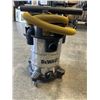 Image 3 : DEWALT STAINLESS 8 GALLON WET DRY SHOP-VAC WORKING WITH HOSE