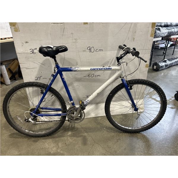 WHITE AND BLUE CANNONDALE BIKE