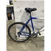 Image 3 : WHITE AND BLUE CANNONDALE BIKE