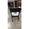 Image 5 : GLASS TOP DINETTE TABLE AND 4 SOLID WOOD CHAIRS