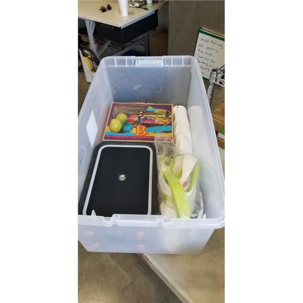 STORAGE TOTE WITH ASSORTED KIDS YARD TOYS AND SKULLCANDY PEAKER, DOESNT TURN ON