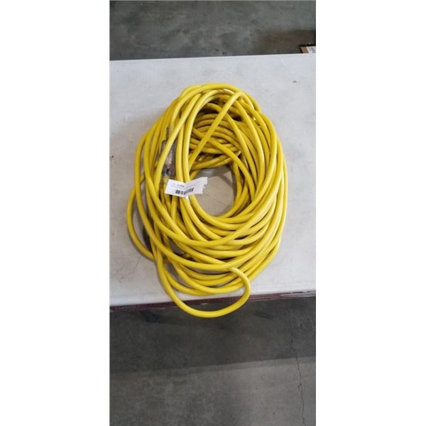 APPROX 100 FOOT YELLOW HEAVY DUTY EXTENSION CORD. 12AWG/3C