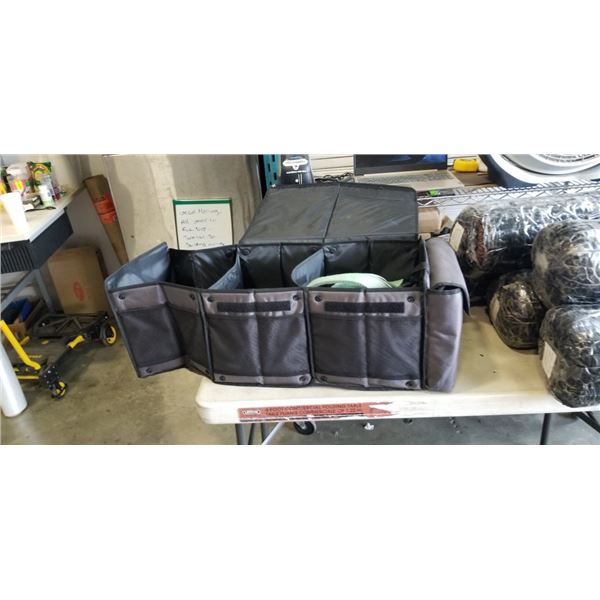 TRUNK ORGANIZER BIN WITH ASSORTED STRAPS AND SMALL FIRST AID KIT