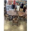 Image 1 : ANTIQUE DINING TABLE ON CASTERS W/ 4 CHAIRS AND LEAF