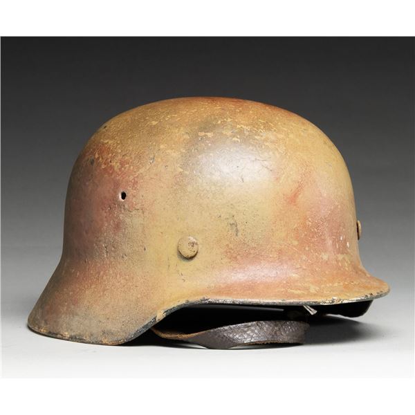 WWII GERMAN M40 CAMOUFLAGE HELMET.