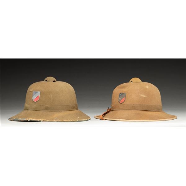 LOT OF 2 GERMAN WWII DAK SUN HELMETS.