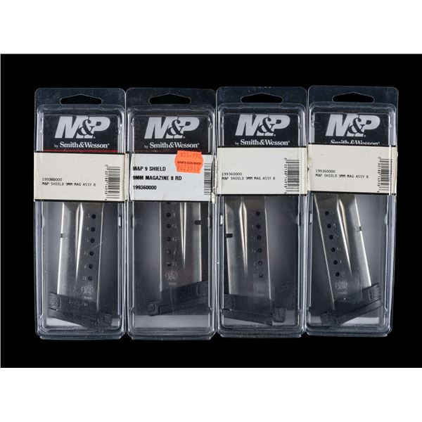 4 NEW IN THE BOX S&W MAGAZINES.