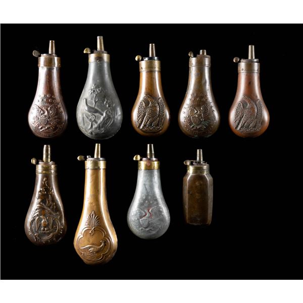 GROUP OF 9 PISTOL FLASKS.