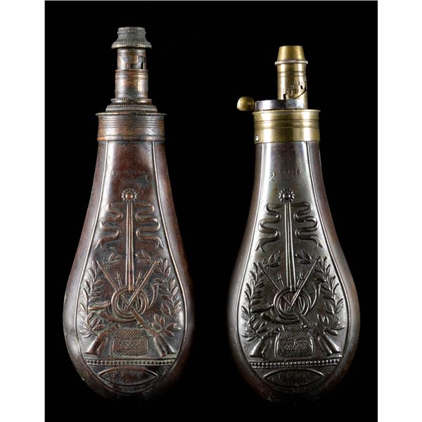 PAIR OF FRENCH EMBOSSED RIFLE POWDER FLASKS.