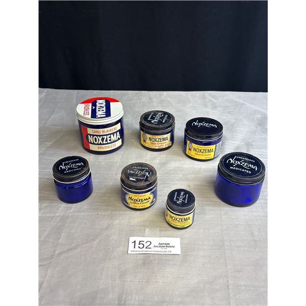 Lot of 7 Noxzema Blue Glass Jars w/ Lids and Paper Labels