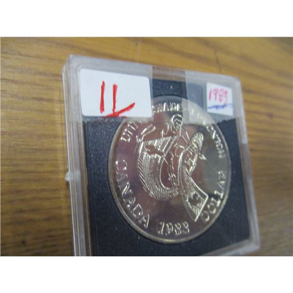 1983 SILVER UNIVERSAIDE DOLLAR COIN