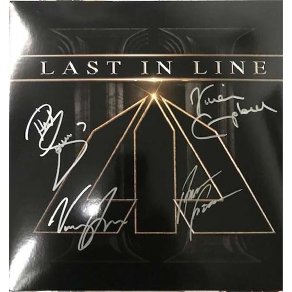 Last in Line album cover signed by Vivian Campbell, Vinnie Appice, Andrew Freeman and Phil Soussan