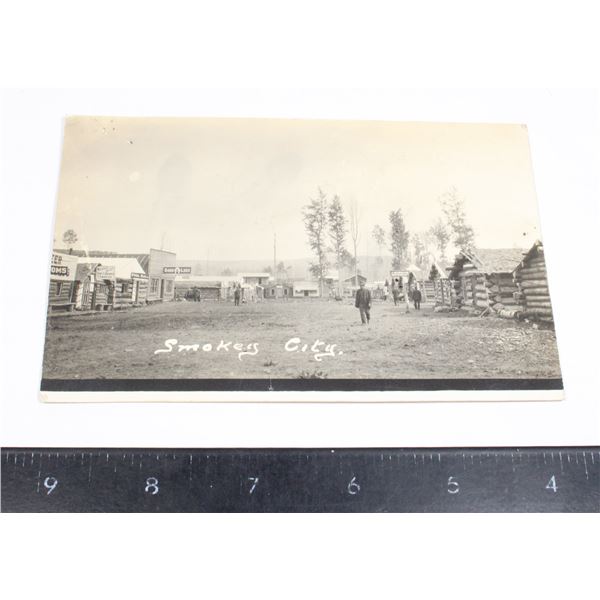 #1495 RPPC Photograph Smokey City Wild West Town