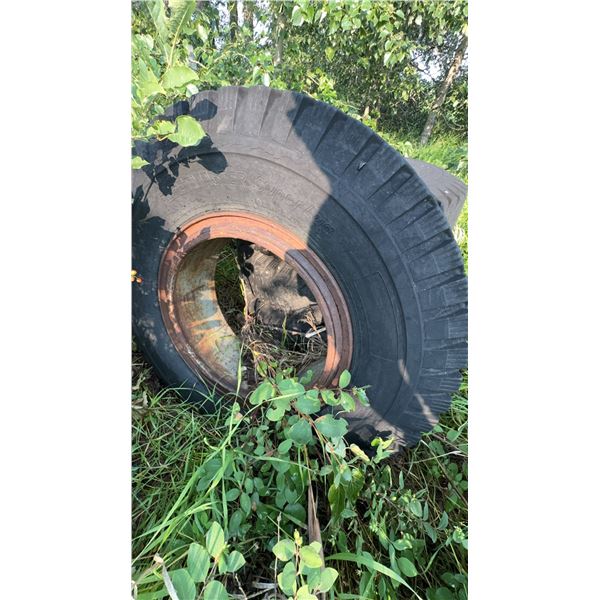 Four Dunlop 11.00-20 Truck Tires with Rims