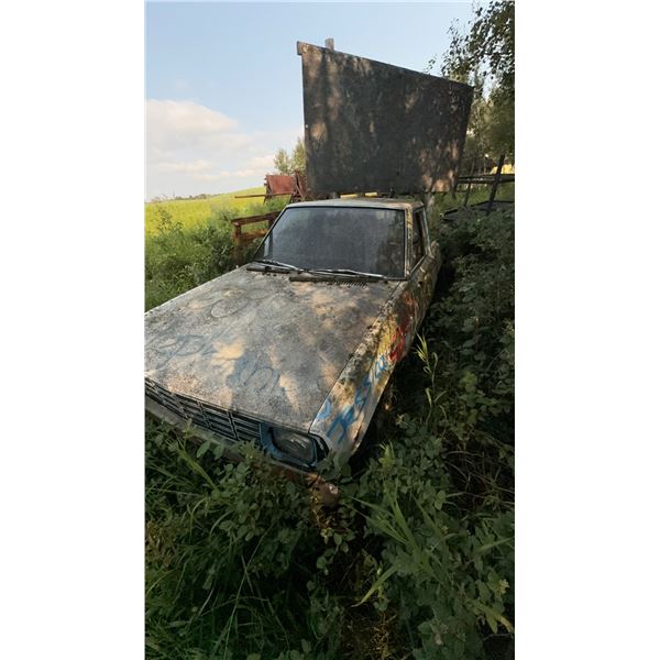 OLD TRUCK AND WOOD SIGN  AND ALL CONTENTS INCLUDED
