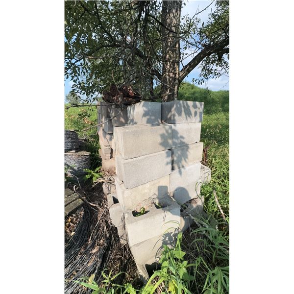 Stack of Assorted Concrete Cinder Blocks