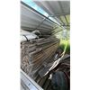 Image 4 : Stack Of Reclaimed Lumber Stored Under Metal Roof