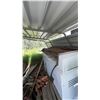 Image 5 : Stack Of Reclaimed Lumber Stored Under Metal Roof