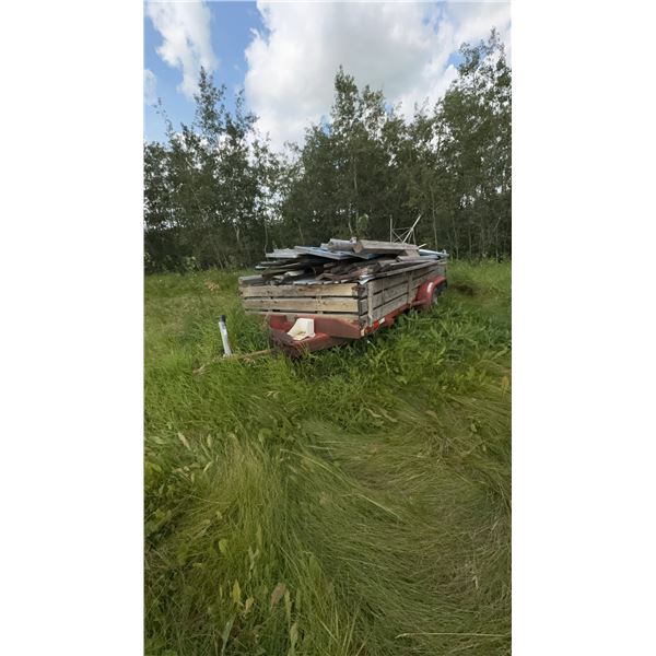 Tandem Axle Utility Trailer With Mixed Metal and Wood Load