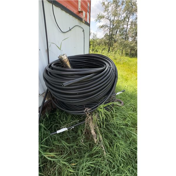 Large Roll of Black Plastic Pipe