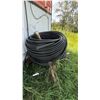Image 1 : Large Roll of Black Plastic Pipe