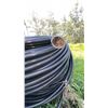 Image 3 : Large Roll of Black Plastic Pipe