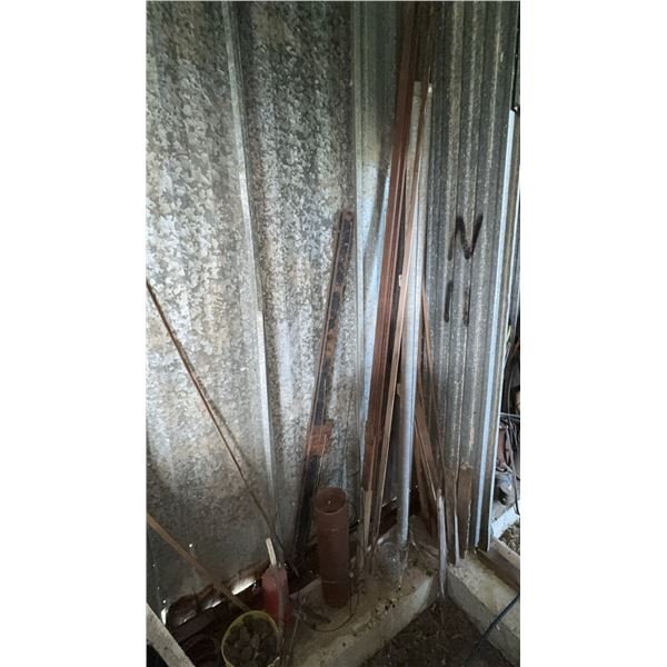 Garage Lot with Tires, Wire, and Metal Items