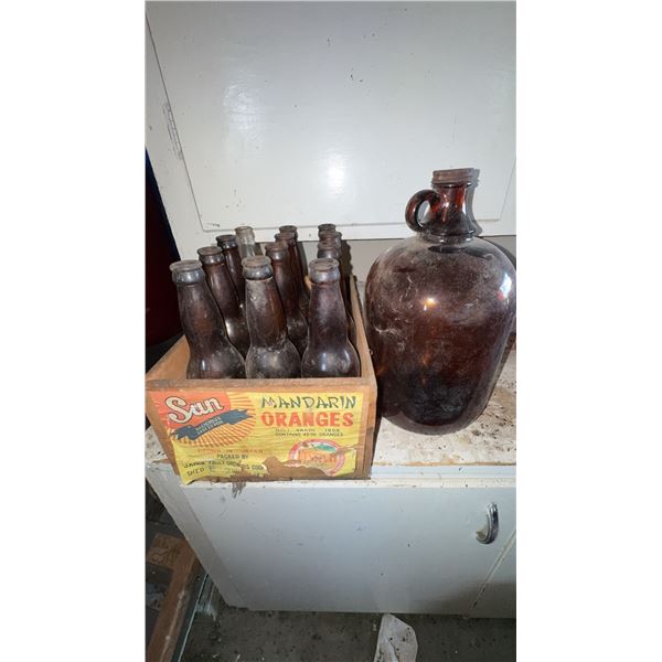 Sun Mandarin Oranges Crate With Vintage Glass Bottles and Jug