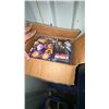 Image 1 : Box of DVDs and VHS Tapes