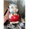 Image 3 : Two Decorative Piggy Banks Including Ceramic Pig with Red Overalls and Green Pig Bank