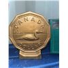 Image 1 : Canada Loon Dollar Coin Bank, 1989, Gold-Tone Cast Metal