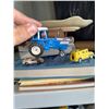 Image 5 : 3 Die-Cast Vehicles: Yellow Armoured Car, Blue Ford Tractor, Beige Sports Car