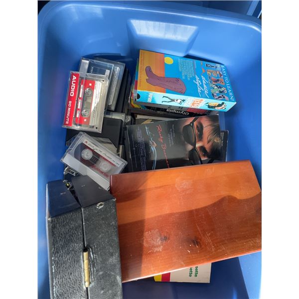 Bin of VHS Tapes, Audiocassette Tapes, and Trinkets