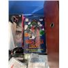 Image 3 : Bin of VHS Tapes, Audiocassette Tapes, and Trinkets