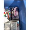 Image 4 : Bin of VHS Tapes, Audiocassette Tapes, and Trinkets