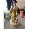 Image 1 : Porcelain Geisha Figurine Music Box with Yellow Kimono and Floral Accents
