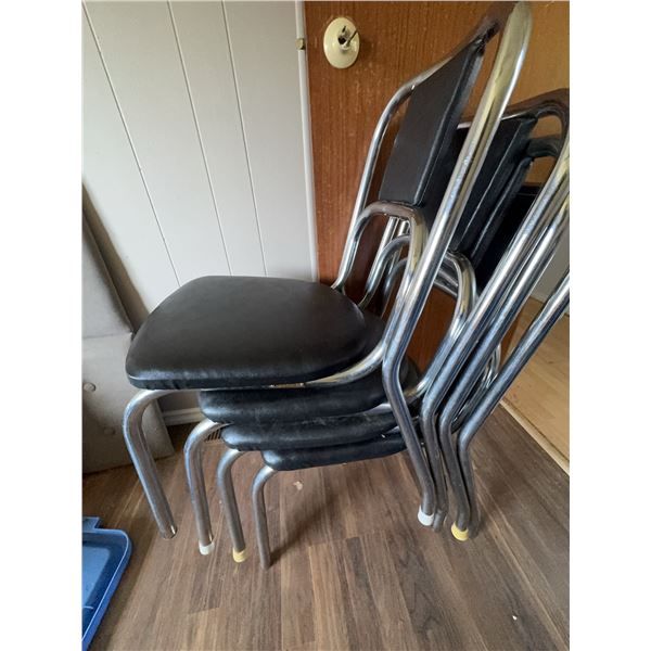 Four Black Vinyl and Chrome Stackable Chairs